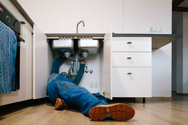 Professional Emergency Plumber technician working in Nevada, MO
